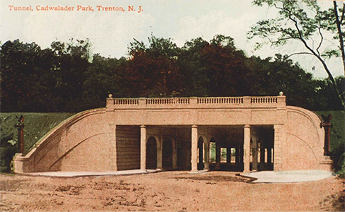 This colorized postcard shows the aqueduct that conveys the Delaware and Raritan Canal over Parkside Avenue in the City of Trenton